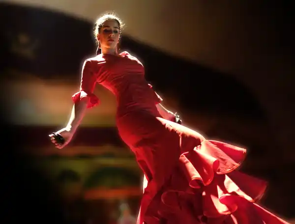 A Flamenco dancer in a red dress