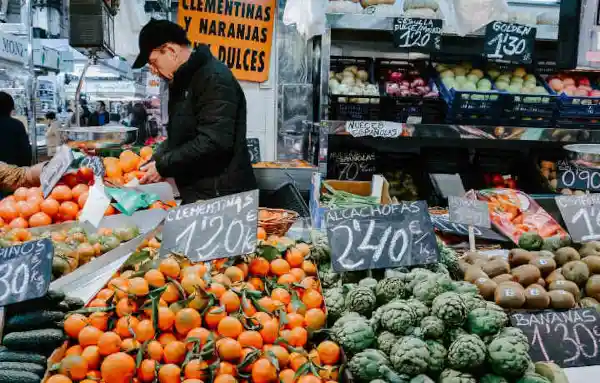 A Spanish market stall selling fruit and vegetables