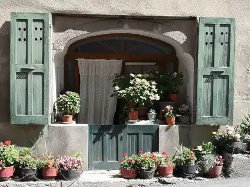 Flowers deck the entrance to a house in Provence