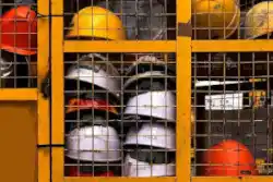 HSE and security - a cage full of hard hats - Halifax Translation Agency references